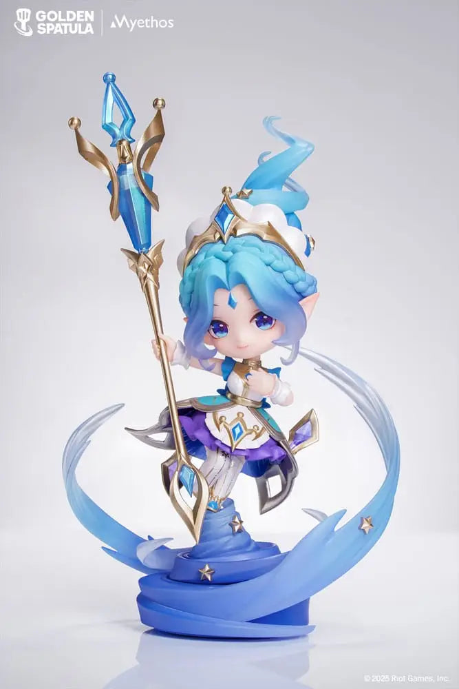 Animated character figurine with blue hair and a staff on a white background