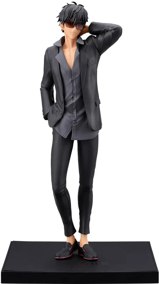A collectible anime figurine of a male character with dark hair and sunglasses, wearing a dark gray suit, standing on a black display base against a white background.