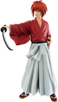 Figure of a character in red kimono with white pants holding a sword on a white background