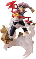 Action figure of a character from an animated series with red hair and goggles, standing on rocks.
