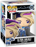 Funko Pop! Games vinyl figure of K/DA Akali, number 1221, in its original window box packaging. The figure features blonde hair with purple streaks and blue armor.