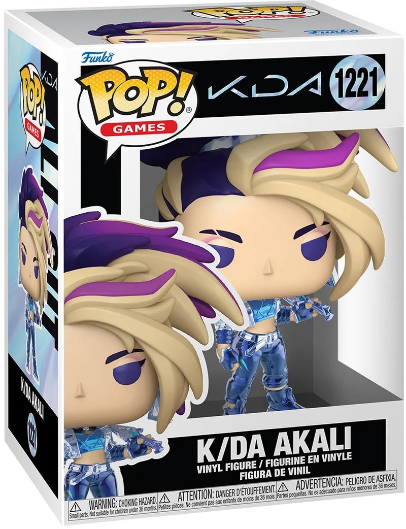 Funko Pop! Games vinyl figure of K/DA Akali, number 1221, in its original window box packaging. The figure features blonde hair with purple streaks and blue armor.
