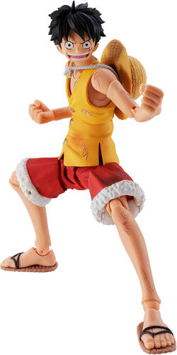 Action figure of a character in a yellow tank top and red shorts with a straw hat on a white background