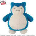 A blue and white fluffy Snorlax plush toy from the Pokémon franchise, shown against a plain white background with a Crane Game logo in the top-left corner.