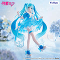 Figurine of a character with blue hair and dress, surrounded by flowers, with 'Furyu' branding.