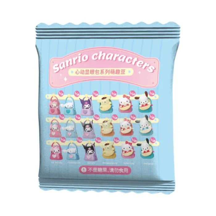 A light blue candy-style packet with scalloped edges, featuring Sanrio characters printed on the front. The packet includes a pink banner reading 'Sanrio characters' and a grid of small character illustrations in pink, purple, yellow, beige, and white, with Chinese text near the bottom.