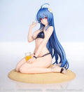 Anime character figurine in a bikini sitting on sand with a drink, against a plain background.