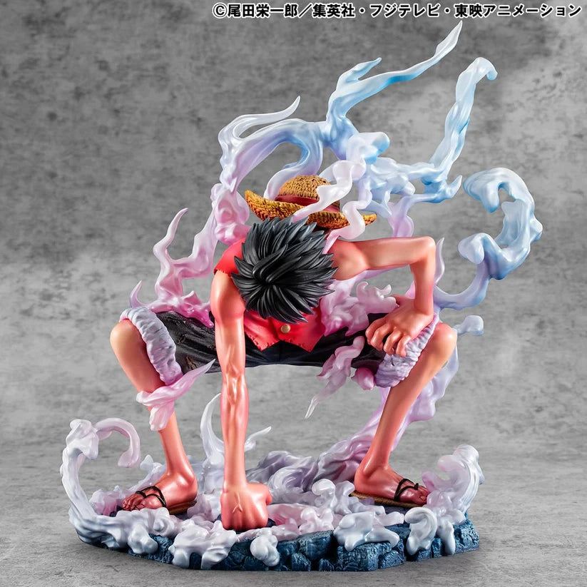 Action figure of a character from an anime on a gray background