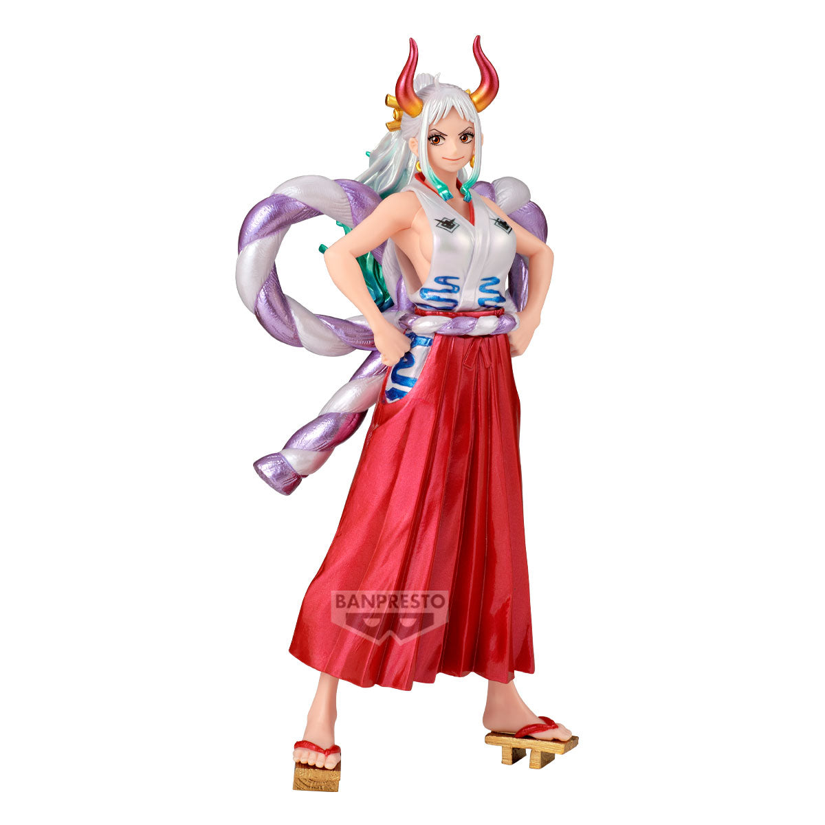 Figurine of a character with red skirt and colorful hair on a white background, featuring the Banpresto logo.