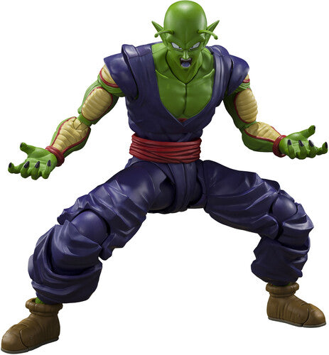 Action figure of a character in green and purple outfit on a white background