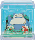 A 3D papercut light-up box featuring the character Snorlax, with layered paper-cut scenery and a transparent acrylic cover.