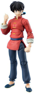 Action figure in a red outfit with blue pants on a white background