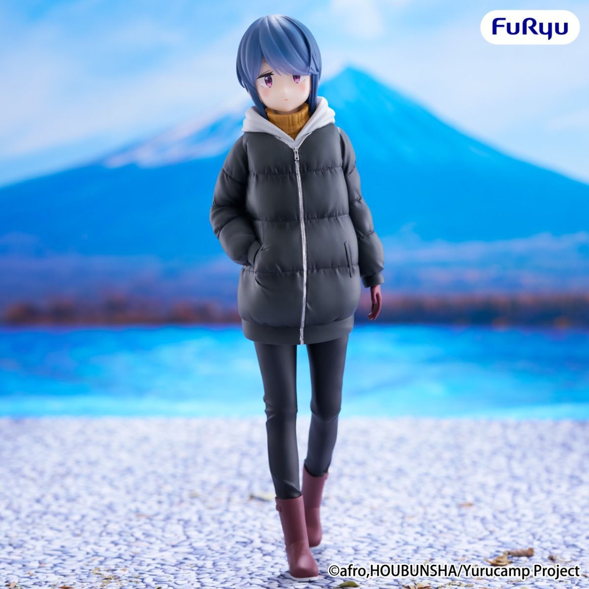 Anime character in a puffer jacket standing in front of Mount Fuji with 'Furyu' branding.