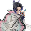 A detailed anime figurine of a character with dark purple hair, butterfly ears, and a white and black butterfly-themed outfit, holding a katana with blue and orange accents against a plain white background.