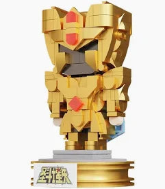 A golden block-built mecha figurine standing on a display base, shown against a plain white background.