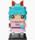 A block-style toy figure of Bulma from the BrickHead Games, built with turquoise, pink, and brown plastic bricks, standing on a black display base against a white background.