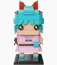 A block-style toy figure of Bulma from the BrickHead Games, built with turquoise, pink, and brown plastic bricks, standing on a black display base against a white background.