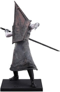 Statue of a character with a triangular headpiece and sword on a white background