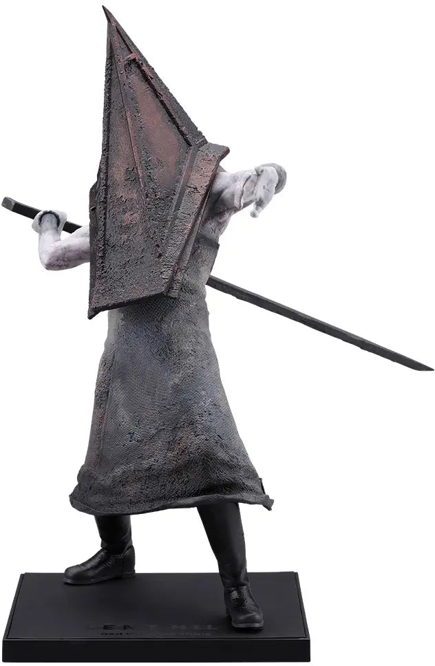 Statue of a character with a triangular headpiece and sword on a white background