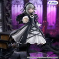 Figurine of a character in a black and white dress with a blurred background