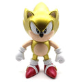 Gold-colored character figurine with red shoes on a white background