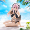 Figurine of a character with pink hair and headphones on a beach with 'Furyu' branding.