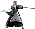 Anime character figurine in traditional outfit with sword on a white background