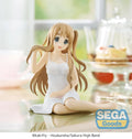 Figurine of a character in a white dress sitting on a surface with 'SEGA Goods' branding.