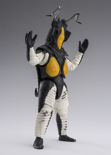 Action figure with black, white, and yellow design on a gray background