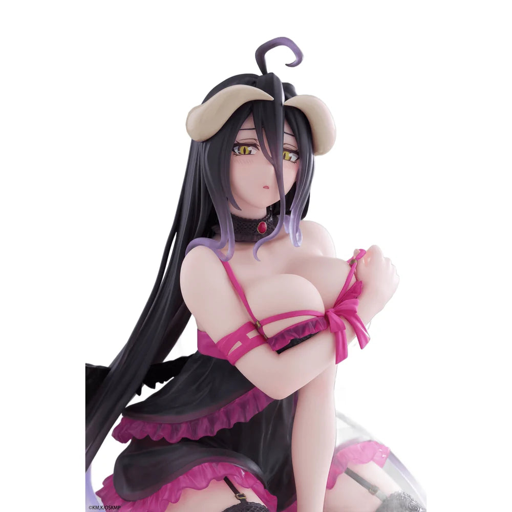 An anime figurine of a female character with long black hair, wearing a black dress with pink ruffles and a matching pink choker, posed against a plain white background.